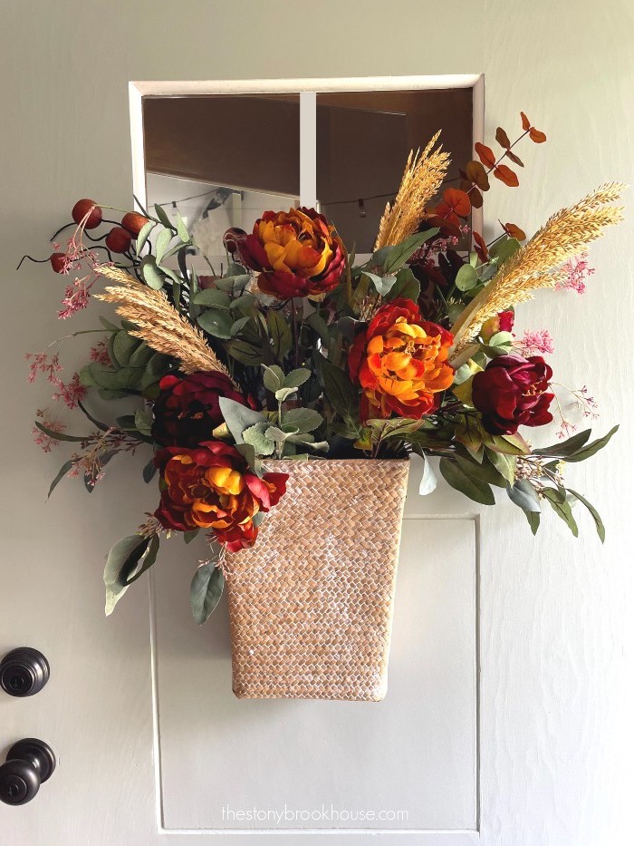 Adding wheat stalks to front door basket