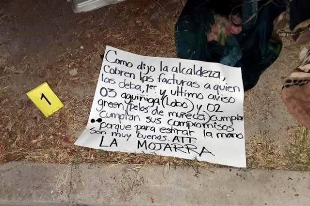  Con mujer encobijada y Narcomensaje  "como dijo la Alcaldesa, cobren las facturas a quien las deba, primer y último aviso 03 Aguiñiga (Lobo) y 02 Green (Pelos de muñeca) Atte. La Mojarra"