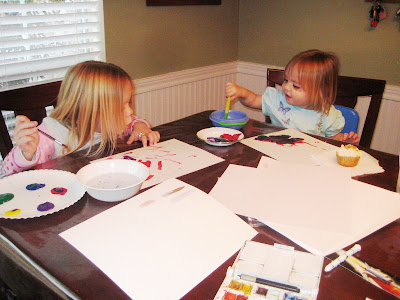 Grandkids painting in watercolors