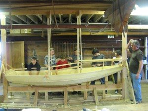 The Guppy, a wooden boat project built by Youth at the Spaulding Wooden boat Center