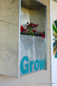 metal planter, repurposed, flowers, http://bec4-beyondthepicketfence.blogspot.com/2015/06/project-challenge-metal.html