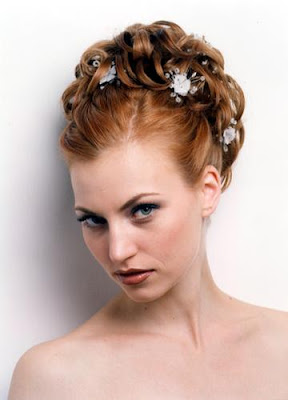 These curly hairstyles can be created to be worn down throughout the event,