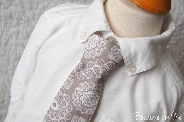 Because I'm Me silver gray medallion print necktie. Subtle simple sophistication.