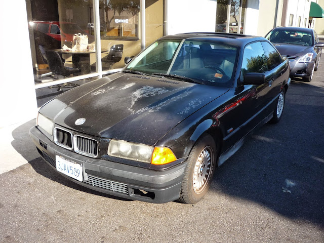 1994 BMW 325iS with peeling paint before repairs at Almost Everything Auto Body