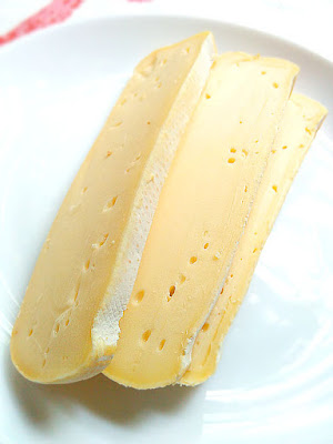 Another angle of the boucheron cheese showing the white rind.