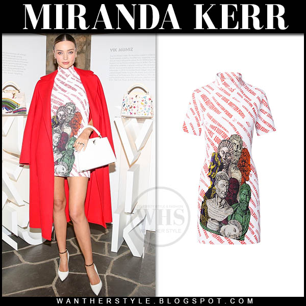 Miranda Kerr in red coat, white printed mini dress and white pumps