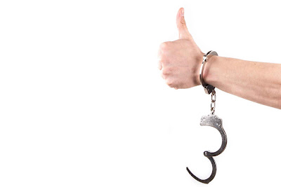 handcuffed trusting inmate