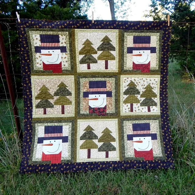 winter pines snowman throw size quilt