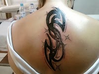 Tribal Tattoo On Lower Back