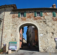 Ancient Roman city gate Porta Senese is the entrance to Castiglione Del Lage