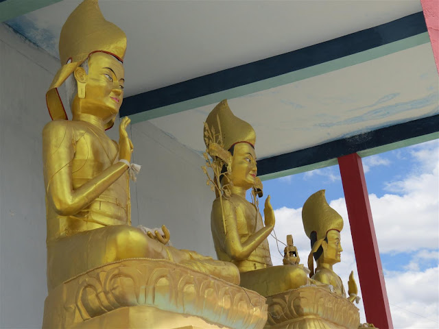 Three statues in Golden near Kye Monastery