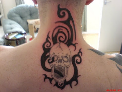 tribal and skull tattoo, neck tattoo, popular tattoo style