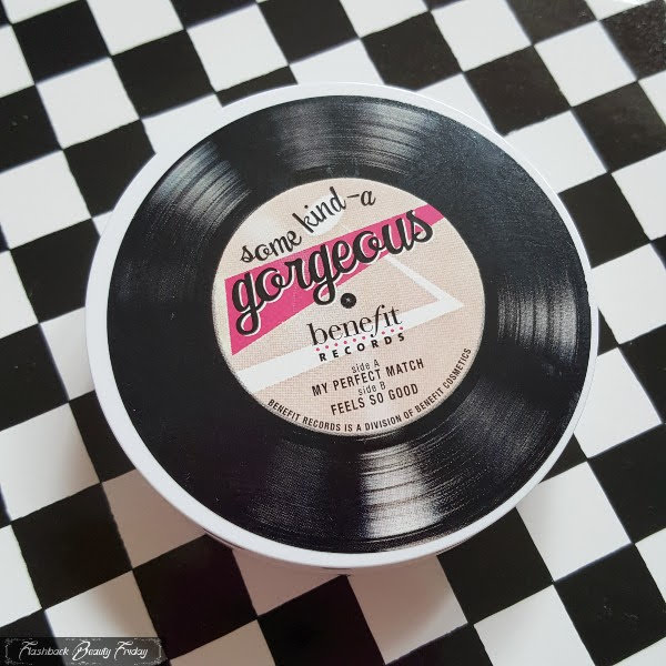 small round compact with black record style cover by BeneFit