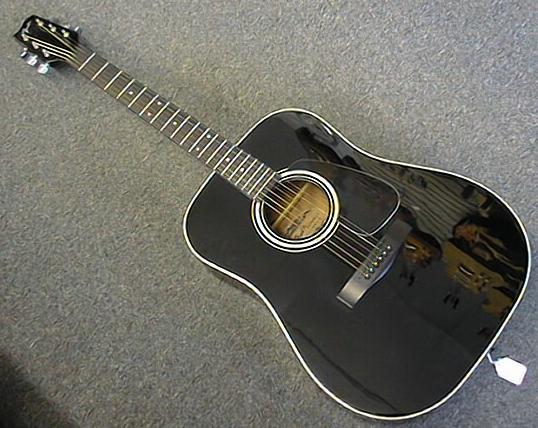 A Fender Acoustic Guitar.