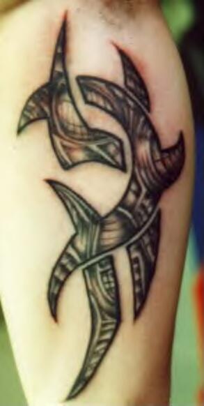 Cool big tribal sign tattoo