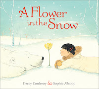 a flower in the snow cover