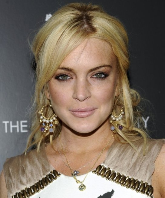 Lindsay Lohan made her red carpet debut once again by stepping on red 