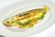 Dover sole simply cooked with butter, lemon and parsley. (dover sole)