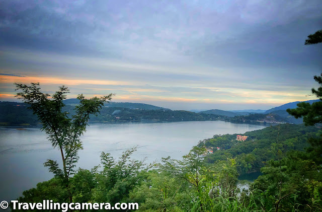 Umiam Lake is a beautiful place to take a stop while you are traveling from Guwahati to Shillong, but it's not just a lunch break spot but a popular tourist place where lot of tourists in this area come and enjoy water-sports apart from day-time picnic activities around lake-side. This blogpost shares more about Umiam Lake and some facts which can help planning your trip better in this part of Meghalaya state in India.     Related Blogpost from Meghalaya - One Day Trip to Mawlynnong Living Root Bridge & Dauki River from Shillong, Meghayala    Umiam lake was built by the Assam State Electricity Board in the early 1960s and it was created because of the dam created on Umiam river. The dam's original purpose was to store water for hydroelectric power generation unit.    Related Blogpost from Meghalaya - One Day Trip from Shillong to Cherrapunji, Meghalaya    The Umiam lake serves as a major tourist attraction for the state of Meghalaya. It is also a popular destination for water sport and adventure facilities. Tourists visit this spot for kayaking, water cycling, scooting and boating.    Related Blogpost from Meghalaya - Mawsmai Caves - A great place to explore in Cherrapunji, Meghalaya (India)    While you are driving on the road from Guwahati to Shillong, the lake comes on your right and visible for quite a long stretch. There are even places where vehicles stop for tea/maggie breaks from where Umiam lake can be seen. The only photograph used in this blogpost is clicked from one of the break points around the road overlooking Umiam Lake in Meghalaya.     Related Blogpost from Meghalaya - Mawlynnong - Meghalayan Village known for it's cleanness & Living Root Bridge    Apart from storing water in Umiam Lake for electricity generation, Umiam Lake also provides numerous ecosystem services at micro as well as macro levels. Downstream irrigation, fisheries and drinking water cater to local needs & create plenty of opportunities for people living around the lake.    Related blogpost from Meghalaya - Seven Sisters Waterfall, Cherrapunji || Nohsngithiang Falls of Meghalaya    Umiam lake is in outskirts of Shillong and can be visited as a part of Shillong sight seeing or while travelling to or from Guwahati. Boating is available at Umiam Lake. Two types of boats take either 5 or 10 people. One has to wait till gathering of required number of people to buy boating tickets. The place is maintained very cleanly.     Related Blogpost from Meghalaya - Unusual boating experience at Dawki River, at Bangladesh border in Meghalaya (India)