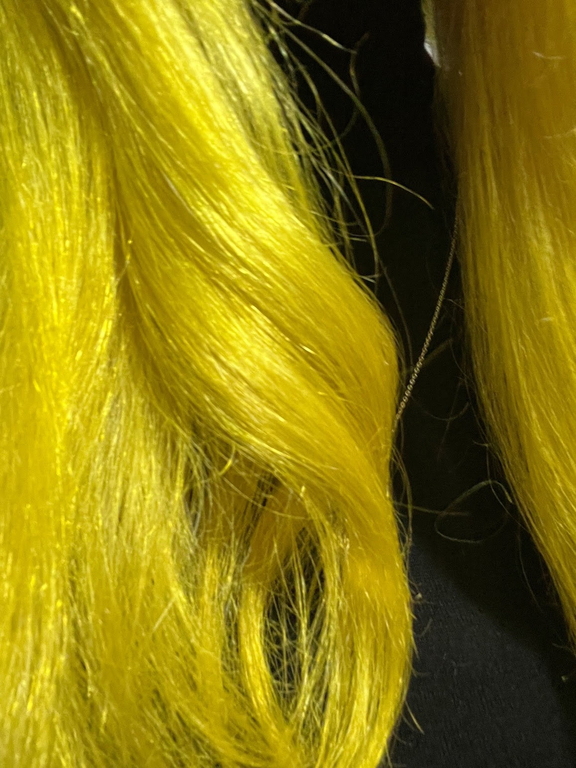 Bleach London Twisted Lemon freshly dyed on long wavy hair
