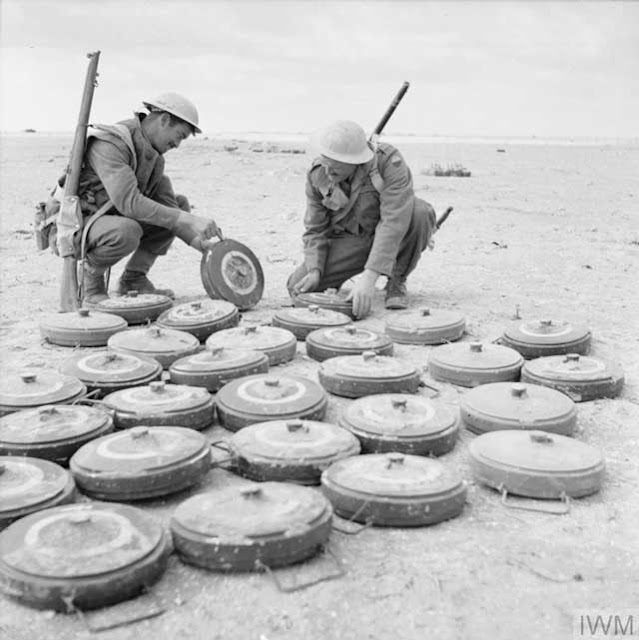 British sappers disarm German mines in North Africa on 12 January 1942 worldwartwo.filminspector.com