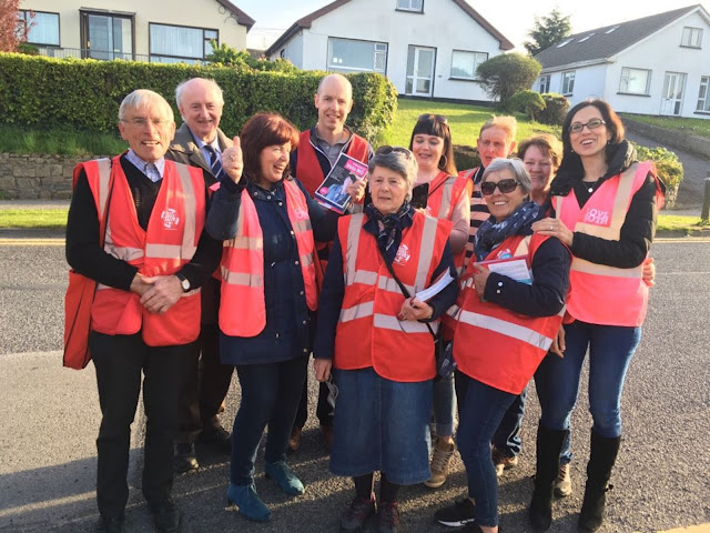 A photo of canvassers knocking on doors in the town of Sligo