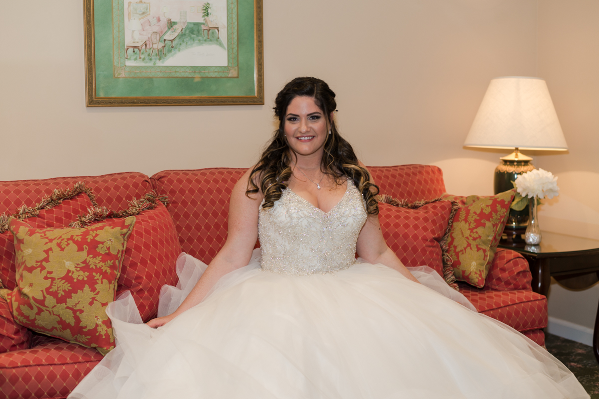 A lovely Bride beautifully adorned with an awesome wedding dress