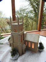 Cardboard model of a church tower.