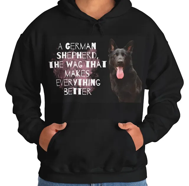 A Hoodie With Giant European Solid Black Female German Shepherd Leaving Her Tongue Out and Caption the Wag that Makes Everything