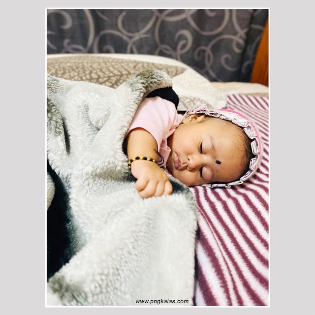 Baby Sleeps on the Bed Free Images