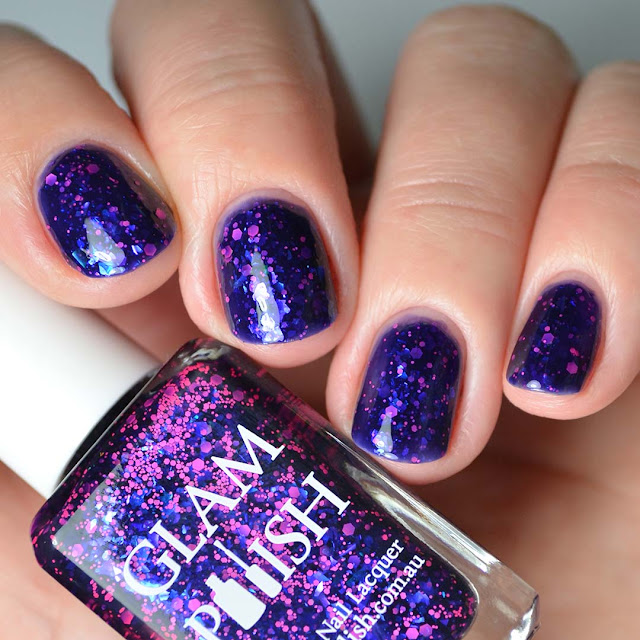 blue nail polish with pink glitter four finger swatch