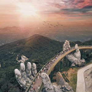 "Cau Vang" or "Golden Bridge", a new footbridge of 490 feet long, 4,600 feet above sea level, built across two giant hands on the top of Ba Na Hills near Danang in central of Vietnam, is now became a best Asian spot for tourists