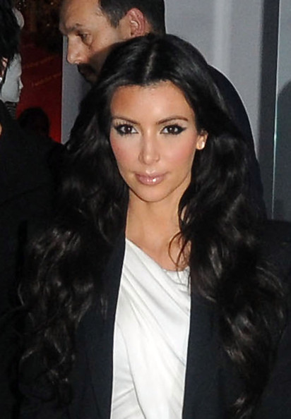 hairstyles 2011 long curly. kim kardashian hairstyles 2011