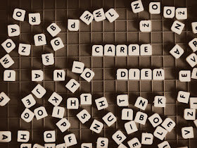 Scrabble tiles that say Carpe Diem