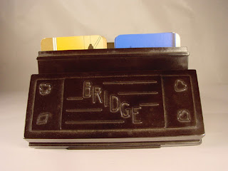 A bakerlite bridge game card holder