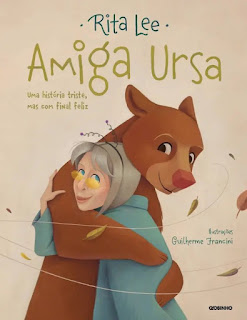 Rita Lee está prestes a lançar seu mais novo livro infantil, Amiga Ursa - Uma história triste, mas com final feliz, que conta a história da ursa Rowena, que passou por tráfico animal e sofreu maus-tratos.  Atualmente, o animal está no Rancho dos Gnomos, no interior de São Paulo, e na última semana a cantora foi até o local para visitá-lo.  "A gente entrou no espaço dela e eu fiquei com vontade de abraçar, de beijar", conta Rita.  Embora Rowena, que antes se chamava Marsha, tenha um ar triste e medo de atitudes generosas, segundo disse a cantora, ela foi bem receptiva.  Na visita, Rita alimentou o animal com suco e bolachas com mel. "Foi um dos dias mais especiais da minha vida, ter visto a felicidade em que ela está."  Descrição da capa do livro em fundo marrom bem claro. Ao centro, a ilustração de uma ursa em caloroso abraço com Rita Lee, uma senhora de cabelos brancos em corte chanel com franja repartida ao meio. Rita usa uma tiara com anteninhas retorcidas em molas, óculos de grau com lentes ovais amareladas e um casaco azul. A ursa Rowena tem expressão amigável e sorriso fácil, igual ao de Rita. Ao redor delas, duas linhas semi circulares remetem ao vento que movimenta algumas folhas no ar. No topo, em letras azuis e finas, lê-se: Rita Lee. Abaixo, em letras verde musgo: Amiga Ursa – Uma história triste, mas com final feliz. No canto inferior direito: Ilustrações Guilherme Francini. Editora Globinho. 