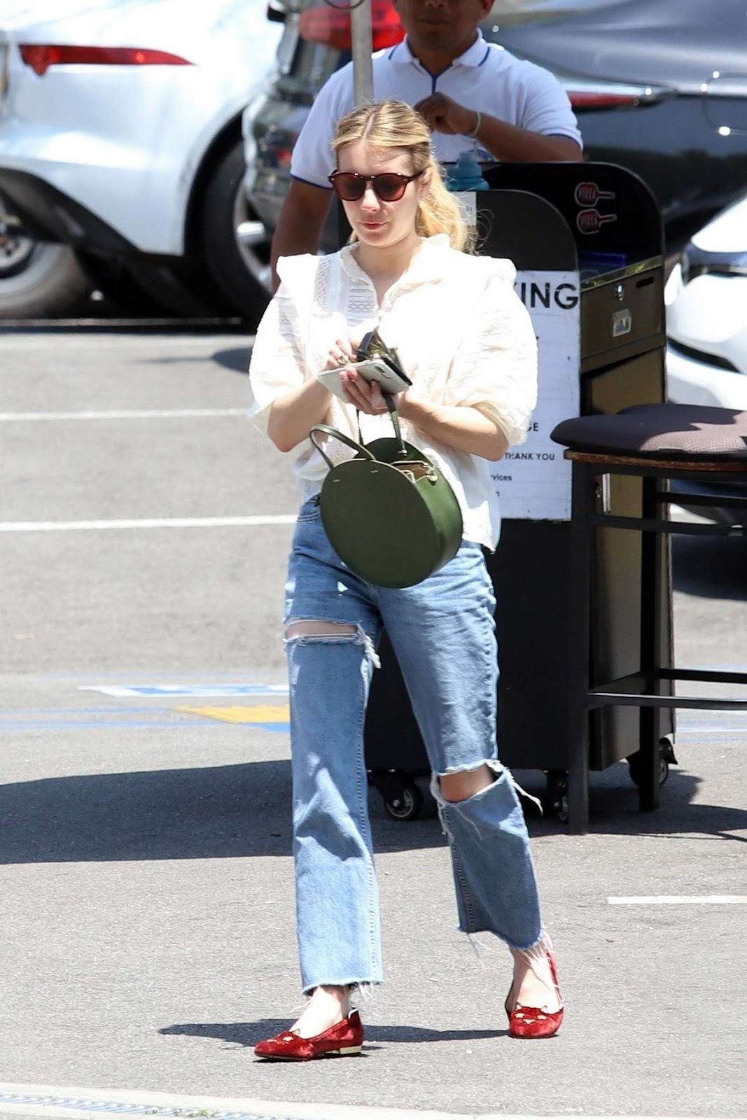 Emma Roberts – Celebrity Street Style in a Ripped Jeans in California