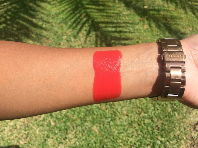 Swatch of a gorgeous red-orange lipstick from Pupa, the Pupa Volume Lipstick in 403