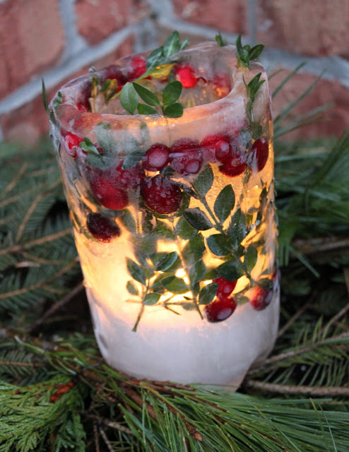 Make a pretty Winter Ice Lantern to warm you up on a cold winter night! So pretty to greet your guests for a party!  |  OhMy-Creative.com