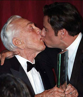 Travolta Kissing Man