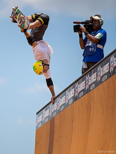 skater inverted on a ramp