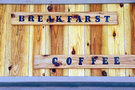 wooden sign, breakfarst and coffee