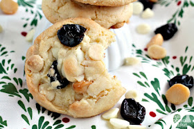 Chock full of creamy white chocolate chips, tart dried cherries, and crunchy macadamia nuts, these thick & chewy White Chocolate Cherry Macadamia Cookies would make the perfect addition to Santa's cookie plate.