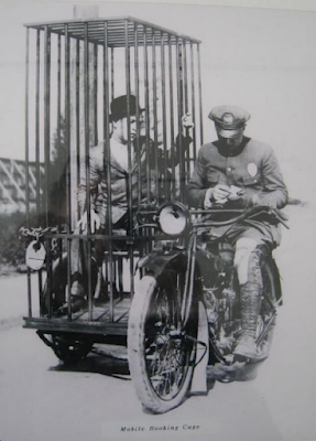 Harley Davidson sidecar is a portable jail cell, 1920′s.  A “mobile booking cage” from the 1920′s… 