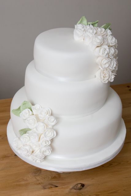 A white rose wedding cake