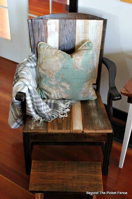 barn wood and pallet wood on an old chair