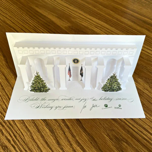 White House pop up Christmas card displayed on table