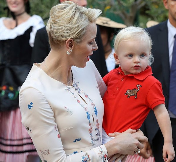 Prince Albert, Princess Charlene attend a dance show with Prince Jacques, the heir apparent to the Monegasque throne during the traditional Monaco's picnic - Pique Nique Monegasque at Le Parc Princesse Antoinette