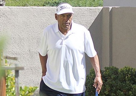 OJ Simpson pictured playing golf with his daughter at his Las Vegas home 
