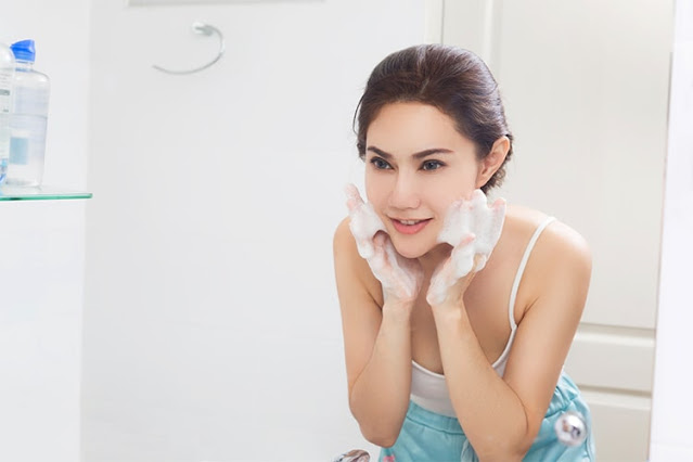 Beauty Woman Wash Her Oily Face for Treatment